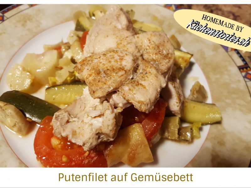 Putenfilet auf Gemüsebett